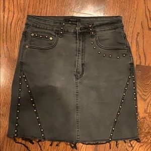 Black jean skirt with balls